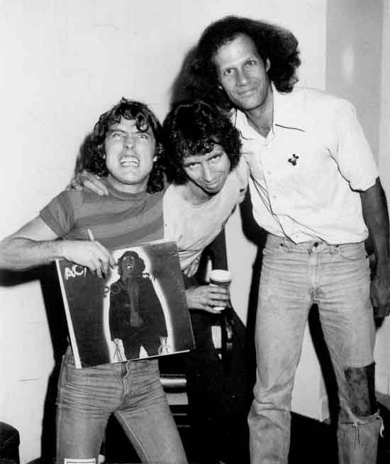 Gary Storm with Angus Young and Bon Scott of ACDC